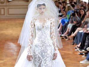 A model presents a creation by Zuhair Murad during the Haute Couture Fall-Winter 2013/2014 collection (AFP PHOTO/MIGUEL MEDINA). 