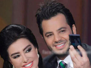 Maisa Moghrabi poses with talk-show host Nishan in happier times at Doha Tribeca film festival