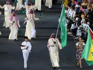 Team Saudi enters the Olympic Opening Flag Ceremony: Behind every man...a woman!