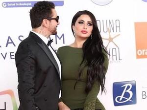 أحمد الفيشاوي وزوجته ندى كامل