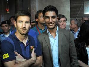 محمد عساف مع نجم الفريق ليونيل ميسي 