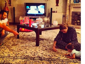 Here's the pic Ghada Tweeted of granddaughter learning to crawl (Image: Twitter)