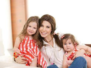Nancy Ajram takes time out for hugs and kisses with her sweet daughters Milla and Ella