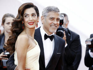 George and Amal Clooney. (Andrea Raffin / Shutterstock.com)