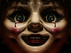 She seems like a nice psycho killer doll. (Warner Bros. Pictures)