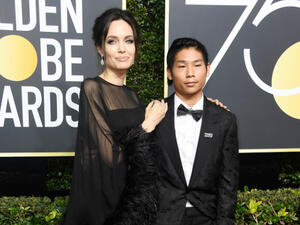 The 42-year-old actress and 14-year-old Pax attended the awards show Sunday at The Beverly Hills Hotel in Beverly Hills, Calif. (Source: Frazer Harrison - Getty Images North America  - AFP)