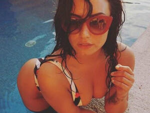 Demi posted a bevy of sultry poolside pics on Friday. (Source: ddlovato - Instagram)