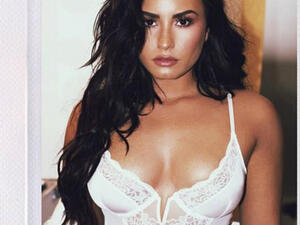 'The deliciously, devious trap was set': Demi Lovato's fans have gone wild over her 'strategic' and VERY public flirting with Superman star Henry Cavill (Source: Demi Lovato - Instagram)