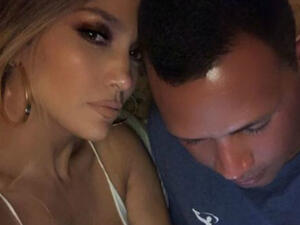 Lopez is voguing for the camera as Rodriguez appears to look at his phone in the picture she posted (Source: Instagram - @jlo)