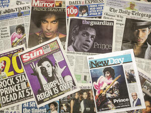 Newspapers announcing Prince's death. (Lenscap Photography / Shutterstock.com)