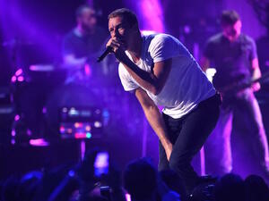 The British band, Coldplay, has the crowd cheering as they ushered in the New Year. (AFP/File)