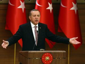 Turkish President Recep Tayyip Erdogan has urged the US and its allies to cut ties with the Kurdish PYD, and now wants them excluded from the ceasefire. (AFP/File)
