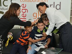 Family celebrating students A level result 