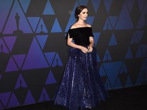 Lily Collins wore a gown by Georges Chakra. (AFP)