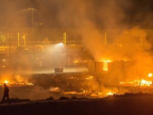 The Grande-Synthe camp near the port of Dunkirk in France was 80 percent destroyed by a blaze. (Twitter)