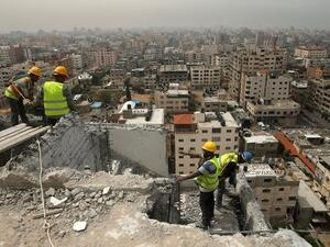 The report said that 91 percent of the 2 billion tons of rubble left by the war have been cleared. (AFP/File)