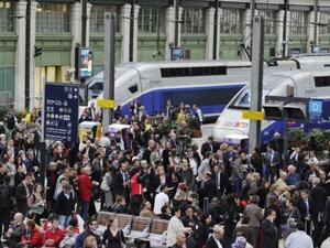 Commuters crowd the platform at the Gare de Lyon train station, where three women were recently arrested on suspicion of plotting an attack. (AFP/File)