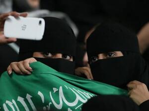 Saudi women take a selfie at a football game in September 2014.  (AFP/Karim Sahib)