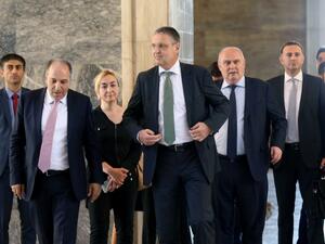 German Secretary of State for Foreign Affairs Markus Ederer (C) walks with Istanbul's deputy Mustafa Yeneroglu of Turkey's ruling Justice and Development Party (AKP) as they visit the damaged Turkish Grand National Assembly in Ankara, on August 8, 2016 following a failed military coup on July 15. (AFP/Adem Altan) German Secretary of State for Foreign Affairs Markus Ederer (C) walks with Istanbul's deputy Mustafa Yeneroglu of Turkey's ruling Justice and Development Party (AKP) as they visit the damaged Turkish Grand National Assembly in Ankara, on August 8, 2016 following a failed military coup on July 15. (AFP/Adem Altan)
