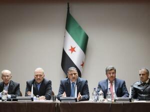 Members of the HNC meet in London (AFP/Fabrice Coffrini)