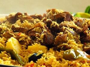 أطباق احتفالية: كبسة لحم بالفرن 