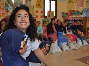 Hend pictured here, not in a cloak, but in her World Food Program shirt, supporting the fight against hunger in the Middle East (Courtesy of Facebook).