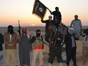 Daesh militants pose with their weapons at sunset. (AFP/File) Daesh militants pose with their weapons at sunset. (AFP/File)