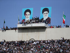 Iranian football fans during a World Cup qualifiying match against China in Tehran, 28 March 2017. (AFP/Atta Kenare)