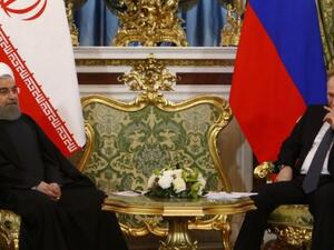 Russian President Vladimir Putin (R) meets with his Iranian counterpart Hassan Rouhani at the Kremlin in Moscow on March 28, 2017. (AFP/Sergei Karpukhin)