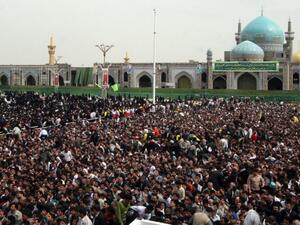 Thousands of Iranians gather in the holy city of Mashhad. (AFP/File)