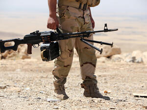 An Iraqi Kurdish Peshmerga fighter holds his weapon while on patrol in Bashiqa, a town northeast of Mosul. (AFP/File) An Iraqi Kurdish Peshmerga fighter holds his weapon while on patrol in Bashiqa, a town northeast of Mosul. (AFP/File)
