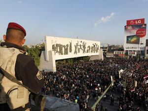 Iraqis, mostly supporters of prominent cleric Moqtada Sadr, take part in a mock funeral procession in Baghdad on February 14, 2017, to pay their respects to seven people killed last week during a protest for electoral reform. (AFP/Sabah Arar)