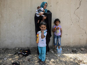 Iraqis displaced from Mosul at a nearby refugee camp (AFP)