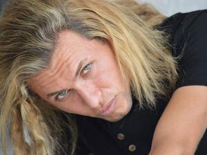 Karar Noshi had been ridiculed online for his "effeminate" appearance. (Facebook)