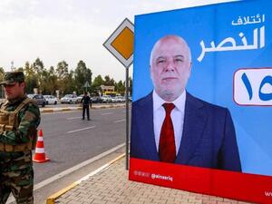 A campaign poster for Iraqi Prime Minister Haidar al-Abadi for the May 12 parliamentary elections. (AFP/ File Photo)
