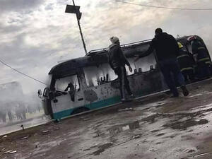 Emergency workers put out fires at the scene of a car bomb in Baghdad's Sadr City on January 2, 2017. (Twitter)