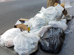 A number of street cleaners told Arab News they are given SR700-SR2,500 each month in cash handouts from passing motorists. (shutterstock)