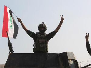 Government Forces Celebrate after Recapturing the City of Ramadi. (AFP)
