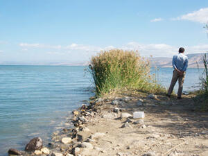 Friends of the Earth Middle East Director Gidon Bromberg stands at the shore of the Dead Sea. (Waterworld)
