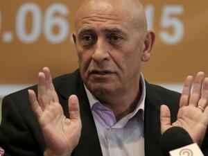 Basel Ghattas of the Israeli Knesset's Joint Arab List voluntarily gave up his parliamentary immunity and was slapped with a travel ban until the investigation was concluded. (AFP/File)