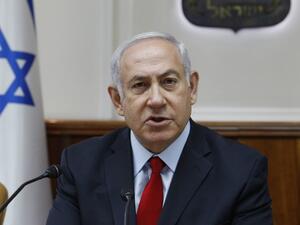 Israeli Prime Minister Benjamin Netanyahu opens the weekly cabinet meeting at his Occupied Jerusalem office on July 23, 2018. (GALI TIBBON / POOL / AFP)