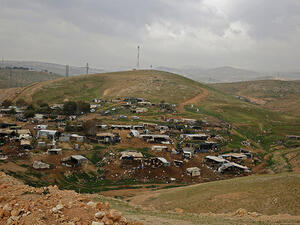 Bulldozers dismantling Khan al-Ahmar (AFP)