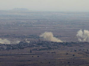 A picture taken from the Israeli-occupied Golan Heights on September 10, 2016 shows smoke rising from the Syrian village of Jubata al-Khashab after Israeli airstrikes against Syrian army positions. (AFP)