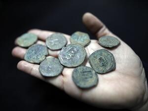 Ancient coins from the Byzantine Empire era (Seventh century) displayed during a press tour of the authority's storerooms on March 19, 2017. (AFP/Menahem Kahana)
