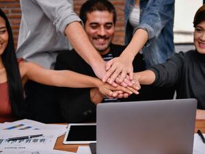 You typically spend eight hours of your day with those people, thus, it is essential to make sure you get along with everyone to reach your common goals and success metrics. Starting and maintaining friendly relationships will ease your day at work and help you work better. (Shutterstock)