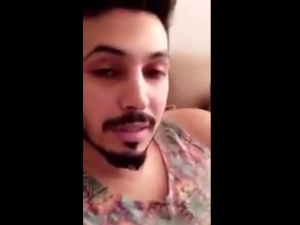 Mamdouh al-Shamri claims the dress he's wearing is from your sister, who left it at his place last night. (Youtube)