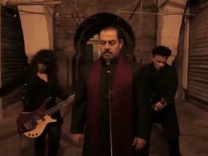 Lutfi Boshnaq (center) is the frontman for a newly formed Islamic metal band based in Tunisia. (Youtube)