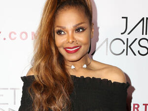 Janet Jackson appeared to be still relishing every moment with her one-year-old son as she cradled the tot in her arms while out with pals in London on Monday. (Source: Kathy Hutchins - Shutterstock)