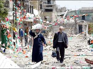 A couple walks through the streets of Jbeil in northern Lebanon. (AFP/File) A couple walks through the streets of Jbeil in northern Lebanon. (AFP/File)