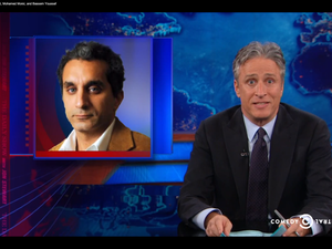 Photo taken from a Daily Show broadcast in which Jon Stewart defends Bassem Youssef from charges against insulting president Morsi and religion. (Albawaba)